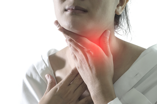 woman with sore throat