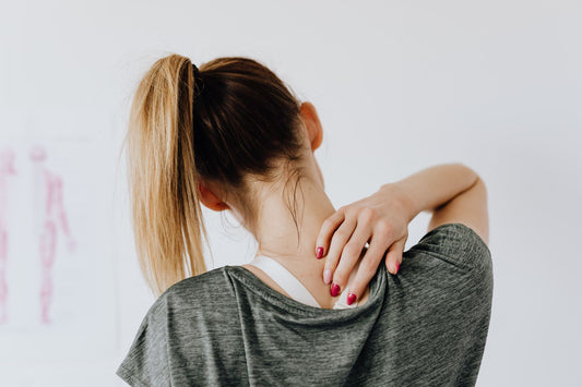 woman experiencing neck pain